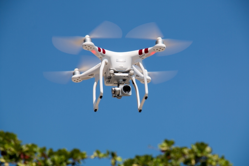 drone-flying-against-blue-sky